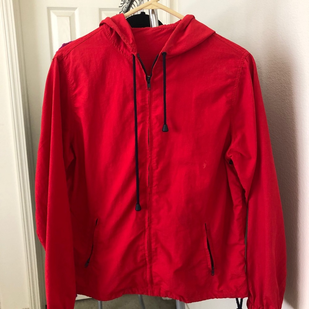 red windbreaker jacket